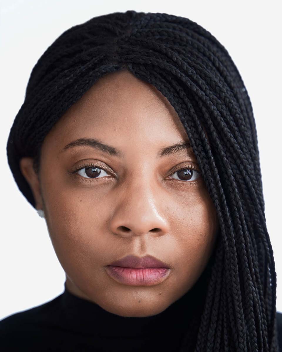 Woman black braids professional portrait closeup NYC
