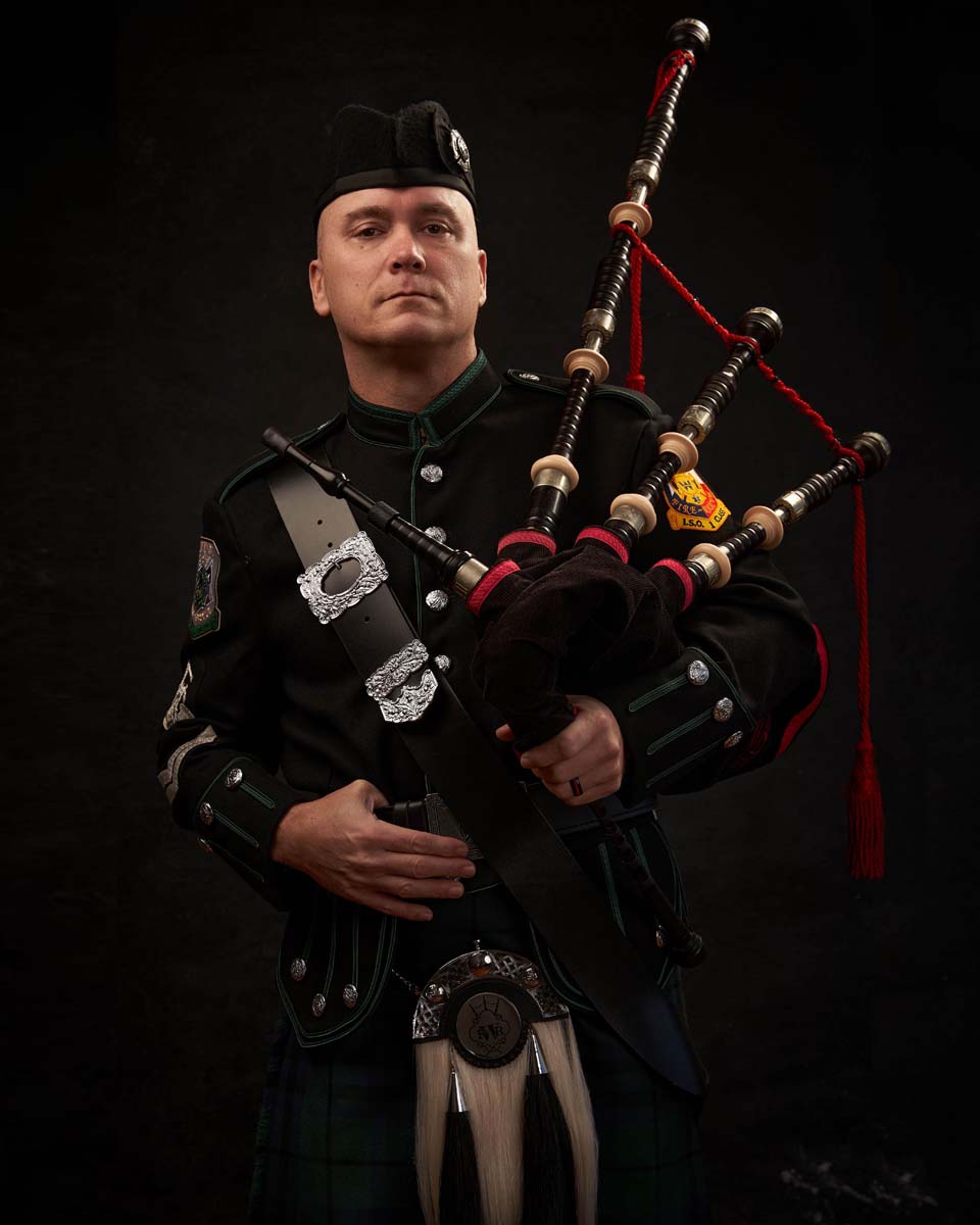 Man bagpipes kilt traditional cultural music portrait NYC