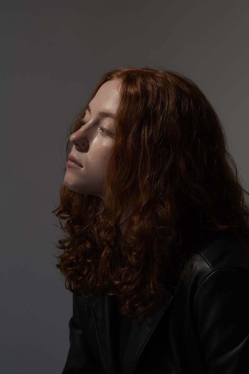 Redhead woman profile sunlit editorial beauty portrait NYC